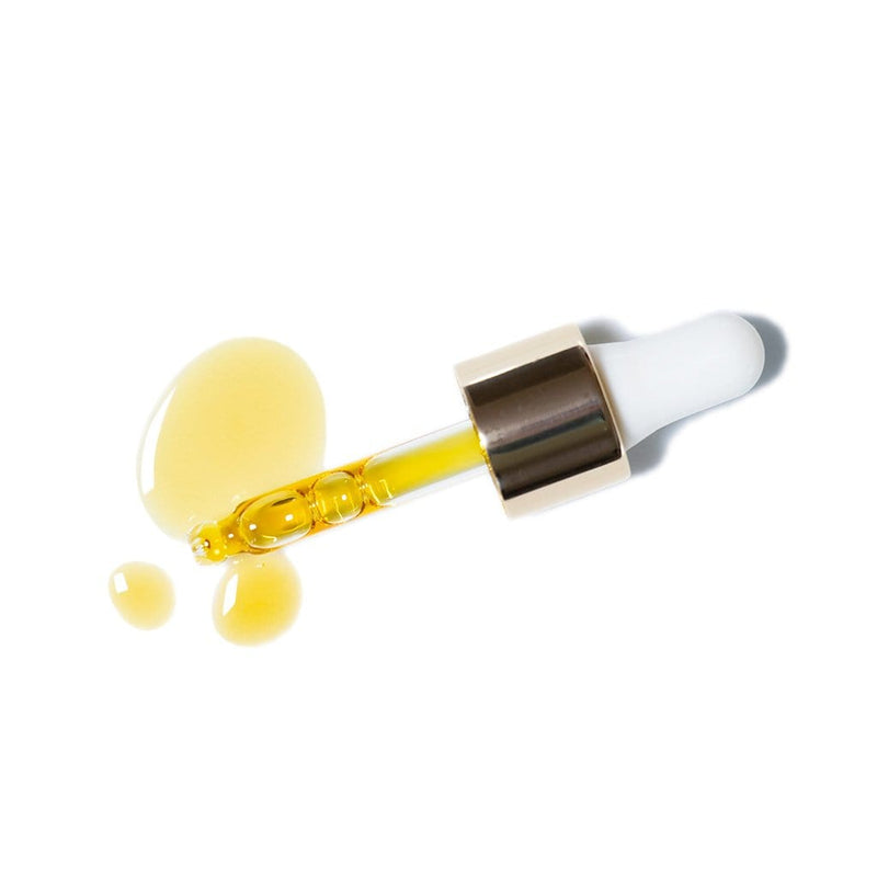Deerieo Aurora Facial Serum pipette with amber coloured serum on a white background.